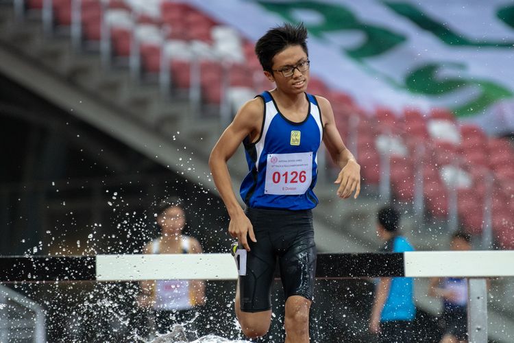 Edwin Huang Jingkai (#126) of Northbrooks Secondary School finished in seventh place in the B Division Boys' 2000m steeplechase final with a time of 07:16.44.