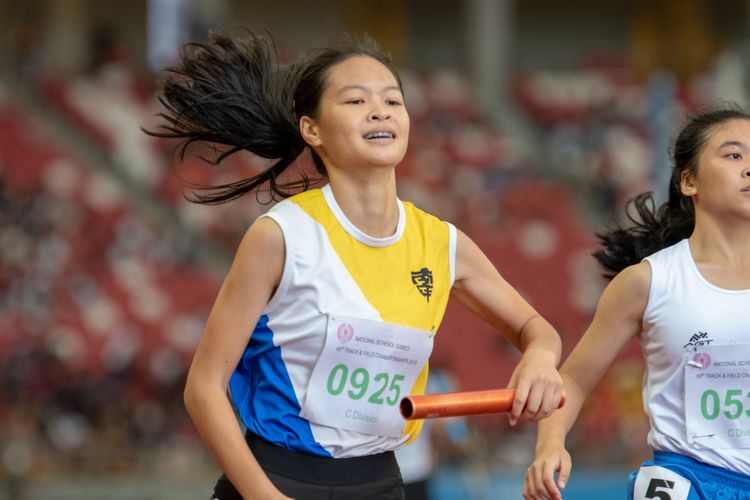 Eleana Goh (#925) of NYGH finished in second place in the C Division Girls' 100m final with a time of 00:13.01.