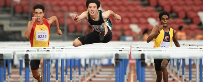 Matz Chan (#123) of RI came in first in the A Division Boys 110 metres hurdles event stopping the clock at 15.70s, while fellow teammate Jered Wong (#112) took silver with a time of 16.15s and Solaimuthu Dhanabalan (#225) of ACJC rounded off the podium coming in at 16.19s. (Photo 1 © Stefanus Ian/Red Sports)