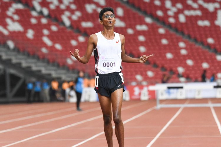 ASRJC's Ruben Loganathan (#1) celebrates his win in the A Division boys' 3000m Steeplechase final. (Photo X © Iman Hashim/Red Sports)