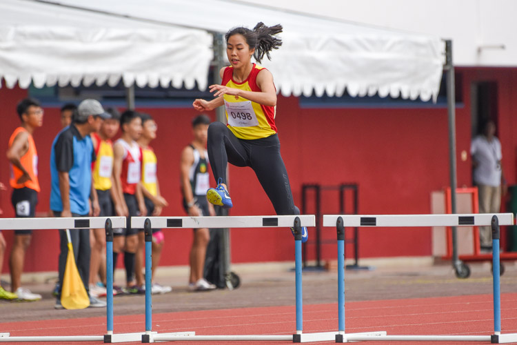 Amanda Ashley Woo of Hwa Chong Institution stopped the clock first in the A Division girls' 400m hurdles final with a time of 1:05.96. Her timing is fourth-fastest in the division's all-time list. (Photo 3 © Iman Hashim/Red Sports)