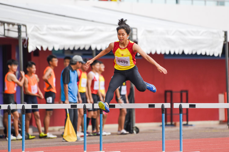 Amanda Ashley Woo of Hwa Chong Institution stopped the clock first in the A Division girls' 400m hurdles final with a time of 1:05.96. Her timing is fourth-fastest in the division's all-time list. (Photo 4 © Iman Hashim/Red Sports)