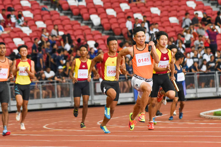 SSP's Nicholas Teo (#145) anchoring his team to the B Division boys' 4x400m relay gold, as HCI's Zeen Chia (#590) and VS's Kieren Lee (#491) give chase. HCI and VS finished in third and fourth respectively. (Photo 1 © Iman Hashim/Red Sports)
