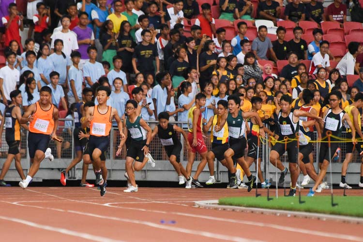 The final baton changeovers in the C Division boys' 4x100m relay. (Photo 1 © Iman Hashim/Red Sports)
