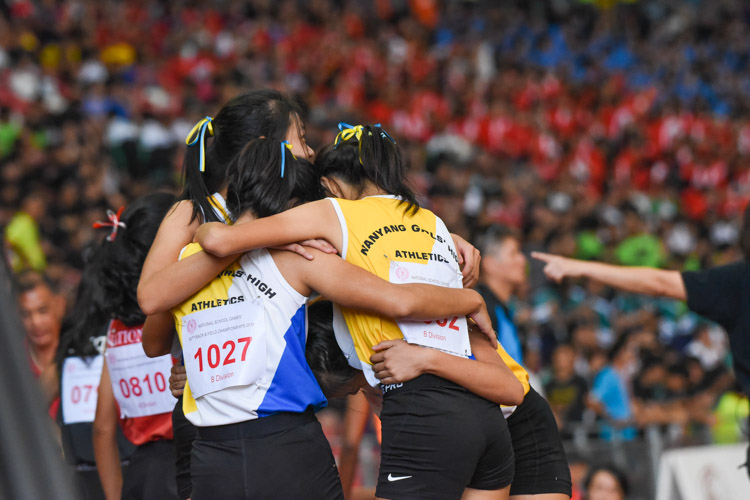 The NYGH team celebrate their win in the B Division girls' 4x400m relay. (Photo 1 © Iman Hashim/Red Sports)