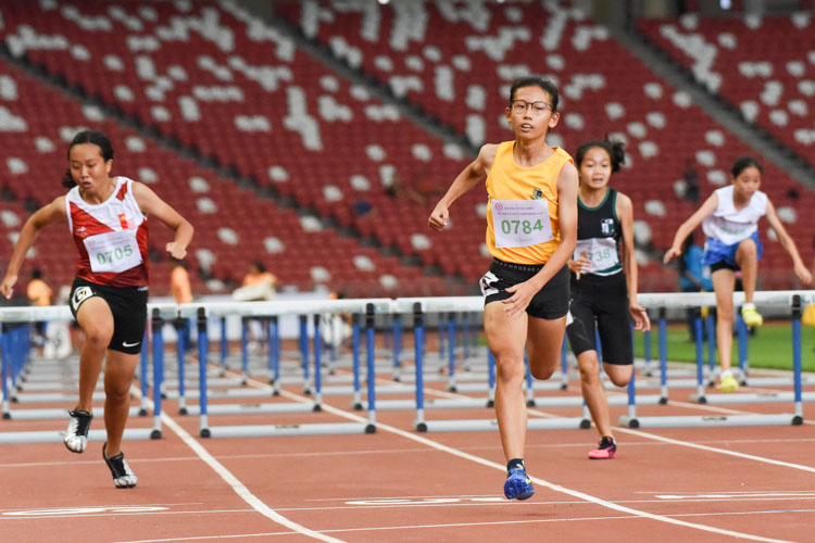 Ashley Tan (#784) of Cedar Girls' stopped the clock at 12.56s to win the C Division girls' 80m hurdles final. Hayley Lim (#705) of NJC finished second while Kaylene Chan (#738) of RGS came in third. (Photo X © Iman Hashim/Red Sports)