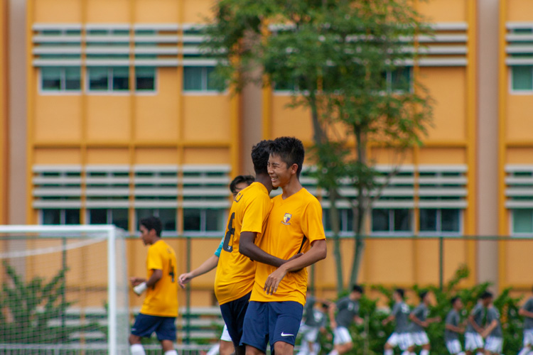 ACJC players celebrating after scoring yet another goal. (Photo 15 © REDintern Jordan Lim)