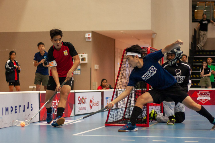 Kim Changgeon (BSS #3)tries to go past a Catholic High player. (Photo 2 © REDintern Jordan Lim)