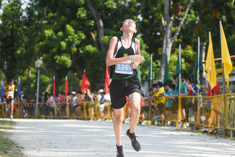 RI's Jonathan Tan finished seventh in the Boys’ C Division cross country race with a time of 14:05.3. (Photo 1 © Iman Hashim/Red Sports)