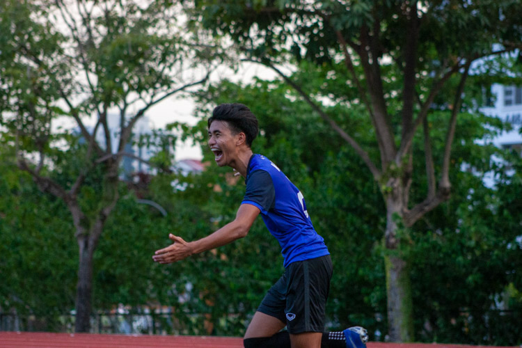 Zahier B Zulkiflee (MI #2) celebrating in ecstasy after scoring directly from a corner kick. (Photo 4 © REDintern Jordan Lim)