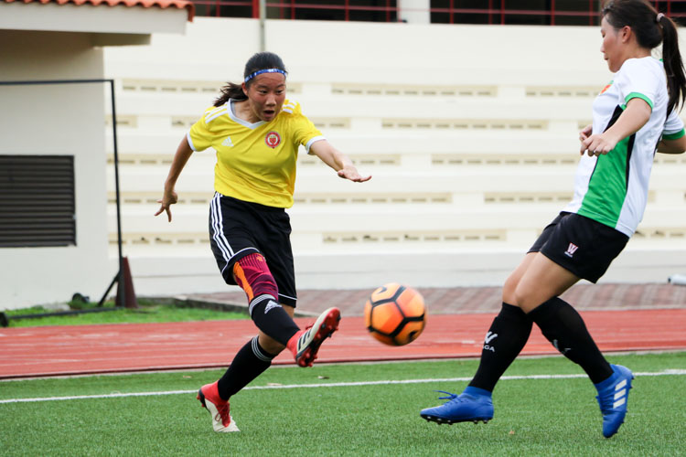 Joie Teo (VJC #10) sends in yet another cross from the right wing. (Photo 4 © Clara Lau/REDintern)