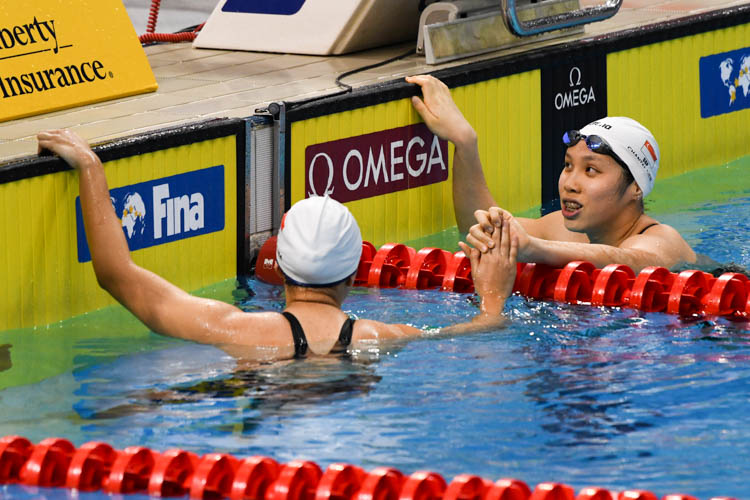 Ashley Lim and Chantal Liew reacting after they clinched second and fifth place respectively in the Women's 400m Freestyle race.