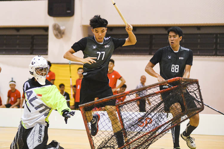 Thaddeus Tan (NTU #77) running into Team ITE's goalpost and knocking it down by accident. NTU put on an offensive exhibition as they demolished Team ITE, who were POL-ITE champions, with a 6-0 victory to clinch the IVP title. (Photo 1 © Stefanus Ian)