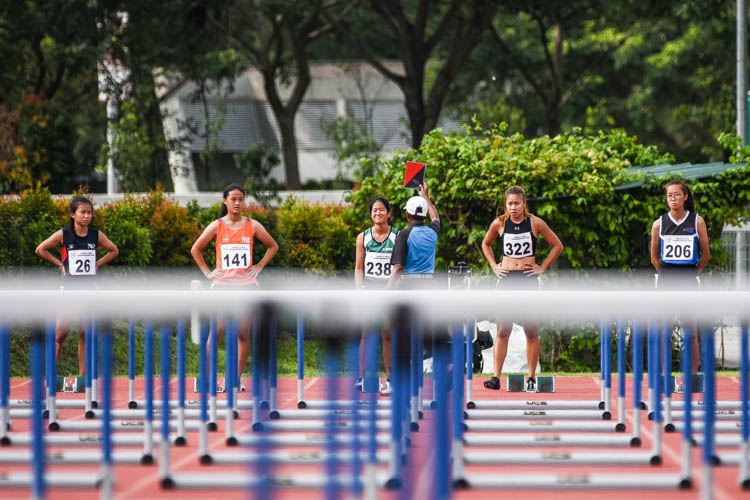 When the realisation hits: Rachel Chin (#238) of Republic Polytechnic reacts after committing a false start in the women's 100m hurdles final. (Photo X © Iman Hashim/Red Sports)