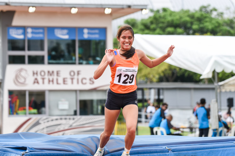 Jezebel Koh of NUS celebrates after a successful clearance in the Women's high jump. (Photo 1 © Iman Hashim/Red Sports)