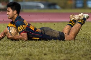 ACS(I)’s Javier Ling diving to score the opening try for Match 1. (Photo 1 © Bryan Foo/Red Sports)