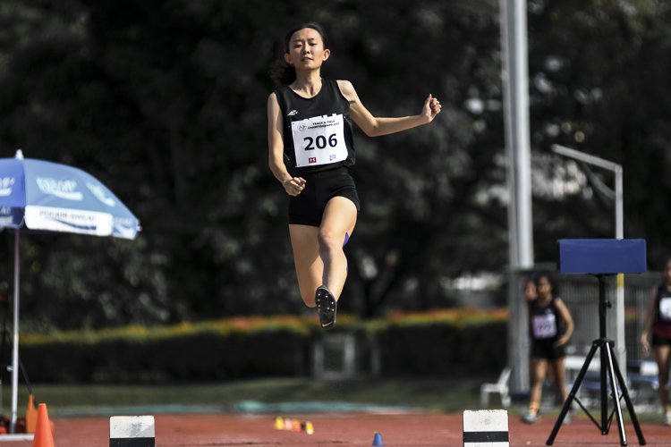 Lim En Ning (#206) of NTU completed a double gold with victory in the women's long jump, leaping a distance of 5.48 metres. This added to her high jump win three days earlier. Tyeisha Khoo (#232) of RP claimed the long jump silver recording a leap of 5.24m, while Valencia Ho (#282) of TP came in third with 5.13m. (Photo 41 © Iman Hashim/Red Sports)