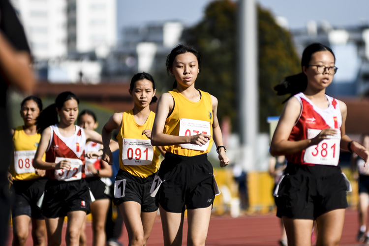 Cedar Girls’ Lin Ziqing (#75) took gold in the B Div girls’ 1500m racewalk, coming in at 8:41.08. (Photo 1 © Iman Hashim/Red Sports)