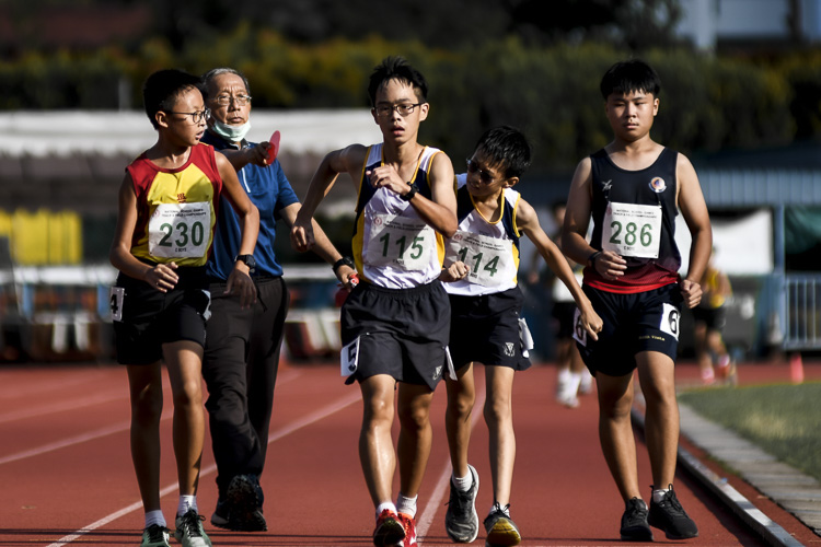 Jonathan Tan (#114) of Catholic High got disqualified for infringing the rules in the last 10 metres of the C Div boys' racewalk final. (Photo 1 © Iman Hashim/Red Sports)