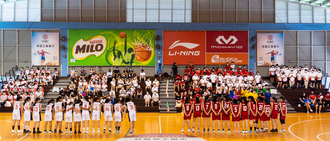National Junior College (NJC) and Hwa Chong Institution (HCI) line up in front of their supporters before the match. (Photo X © Bryan Foo/Red Sports)
