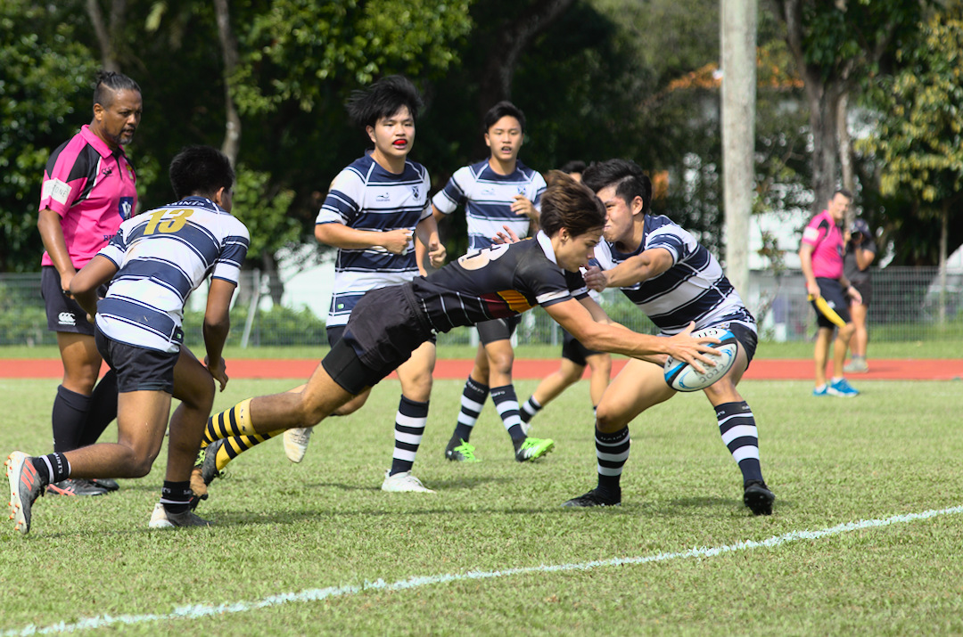 ACJC's Daniel John Graves (#23) dives over to score his second try in Match 2.