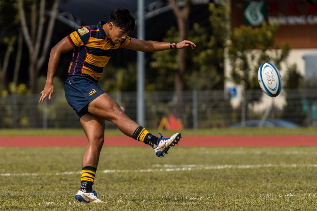 Independent's Tycen Yeoh attempts a conversion. (Photo 5 © Bryan Foo/Red Sports)