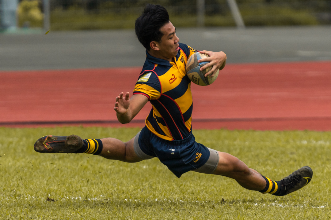 Independent's Julian Wong slides into the try zone, scoring the opening try for Match 1. (Photo 2 © Bryan Foo/Red Sports)