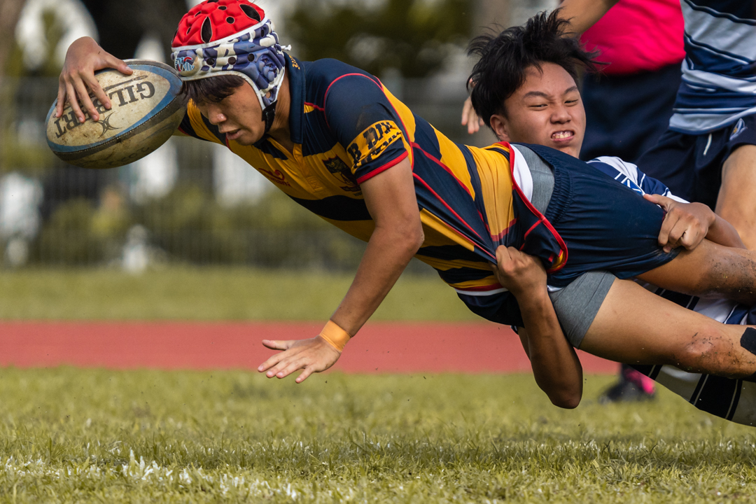 Independent's Bryant Sim stretches out to score a try. (Photo 5 © Bryan Foo/Red Sports)