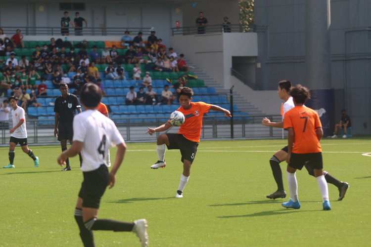 Samid Gurung (SAJC #5) attempts to bring the ball under control in a crowded midfield