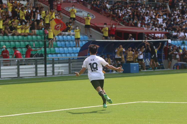 Anton Yen Goh (VJC #19) runs towards VJC supporters after scoring the first and only goal of the game