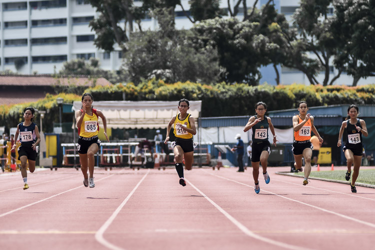 VJC's Ashley Tan (#216), champion in the 100m hurdles, took silver in the A Div girls' 100m final clocking 12.82s. (Photo 1 © Iman Hashim/Red Sports)