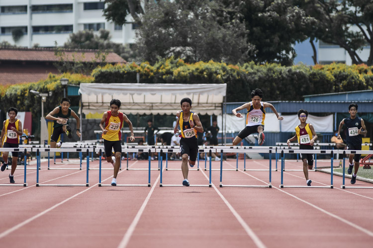 Catholic High's Hayden Ma (#126) took bronze in the C Div boys' 200m hurdles final in 27.63s. (Photo 1 © Iman Hashim/Red Sports)