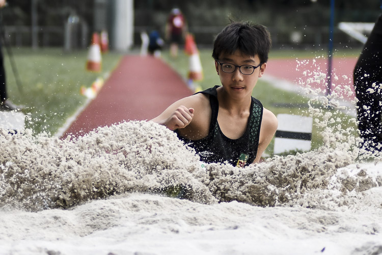 oo Jia Kai (#323) of RI leapt 5.56m to place fourth in the C Division boys' long jump. (Photo 1 © Iman Hashim/Red Sports)