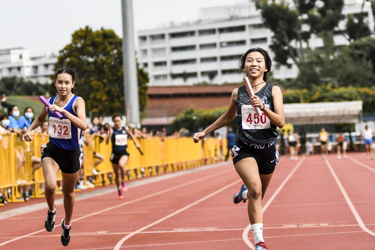 Claire Ang (#450) of RGS crosses the line in third place in the B Div girls' 4x100m relay final. It was her school's first B Division 4x100m medal since 2002. (Photo 1 © Iman Hashim/Red Sports)