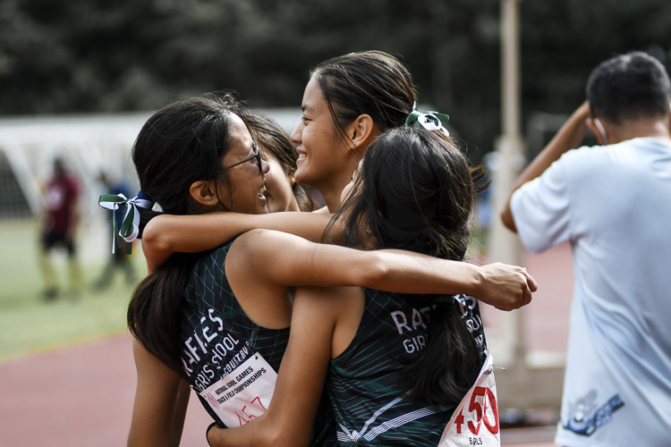 RGS celebrate their bronze in the B Div girls' 4x100m relay final. (Photo 1 © Iman Hashim/Red Sports)