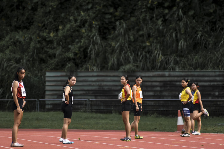 Third runners get ready before the A Div girls' 4x100m relay final. (Photo 1 © Iman Hashim/Red Sports)