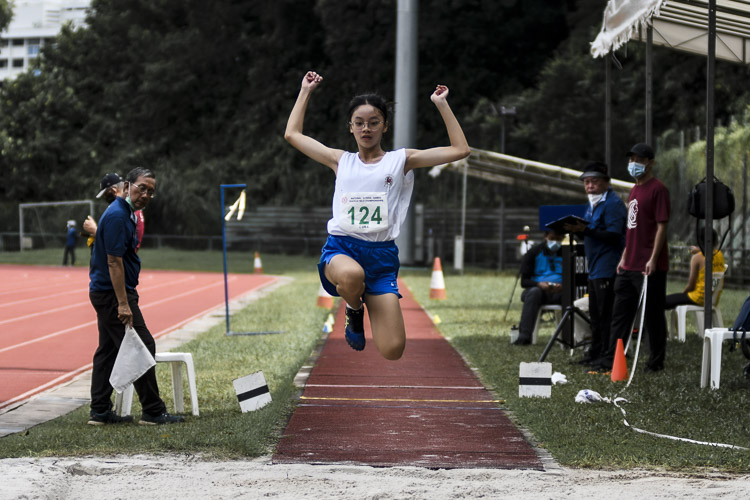 CHIJ St. Nicholas Girls' Chloe Choo (#124) placed seventh in the C Div girls' triple jump. (Photo 1 © Iman Hashim/Red Sports)
