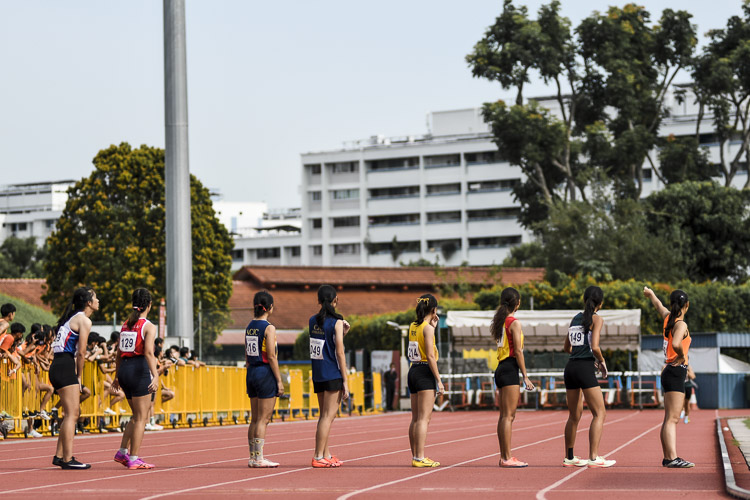 Third runners await their turn in the A Div girls' 4x400m relay final. (Photo 1 © Iman Hashim/Red Sports)