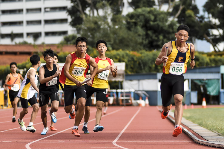 ACS(I)'s John Tan (#56) runs the third leg in the C Div boys' 4x400m relay final. He came back from disappointment in the 4x100m relay final a day earlier where he fell and led to an eventual disqualification for his team. (Photo 1 © Iman Hashim/Red Sports)