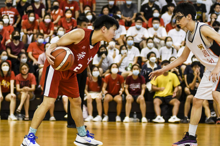 Justin Lin (HCI #2) goes eye-to-eye with his opponent. (Photo 1 © Iman Hashim/Red Sports)