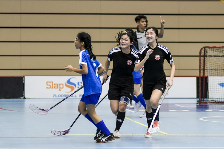 Ning Isabella Pung (VJC #19, right) rejoices with team captain Charmaine Liew (VJC #7) after scoring the equaliser. (Photo 1 © Iman Hashim/Red Sports)