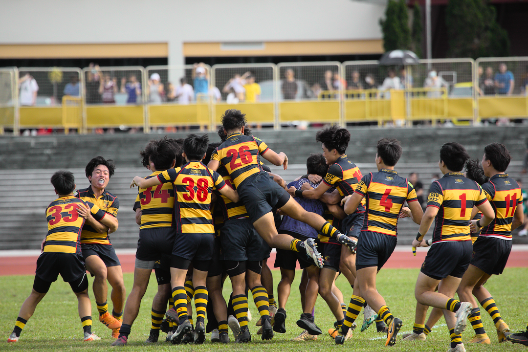 The ACS(I) ruggers leap in jubilation as they take the championship. (Photo 34 © Shenn Tan/Red Sports)