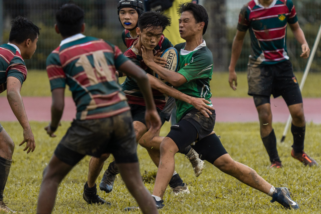 Evergreen player takes the ball into contact. (Photo X © Bryan Foo/Red Sports)