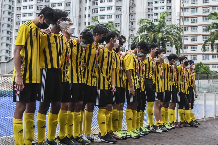 VJC players stand in front of their supporters as they sing the school anthem. (Photo 1 © Iman Hashim/Red Sports)