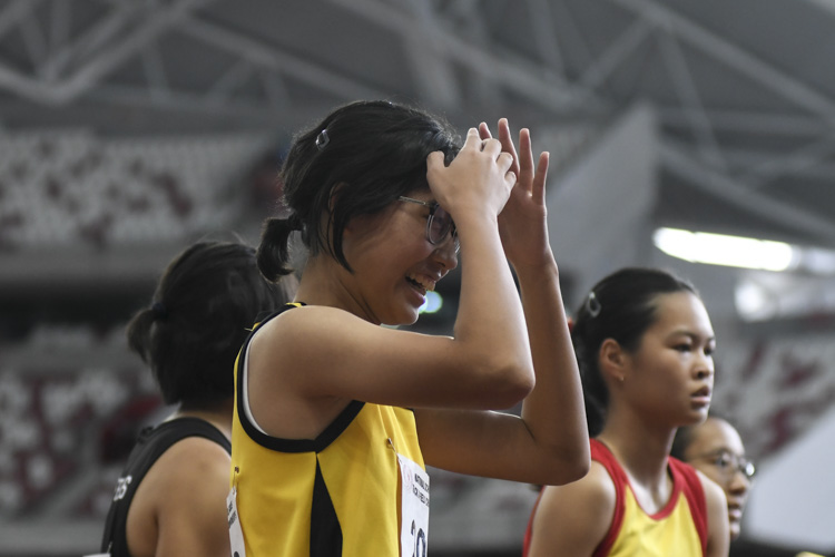 VJC's Ashley Tan reacts after the A Div girls' 100m final.. (Photo 1 © Iman Hashim/Red Sports)