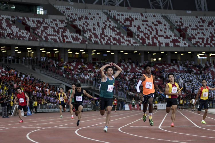 Anchor leg of the B Div boys' 4x100m relay final. RI finished first, followed by SSP and VS. (Photo 1 © Iman Hashim/Red Sports)