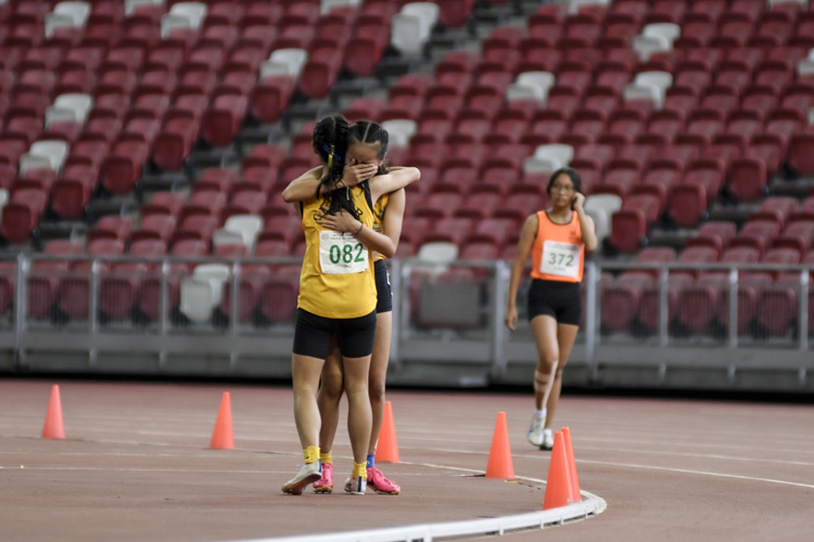 Cedar celebrate after the C Div girls' 4x100m relay final. (Photo 1 © Iman Hashim/Red Sports)