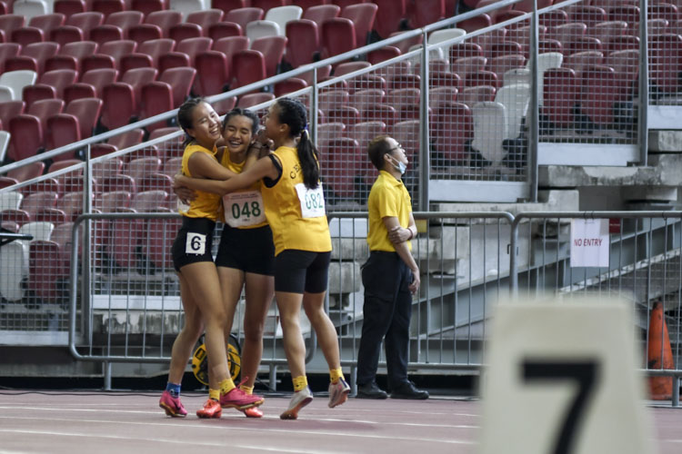 Cedar celebrate after the C Div girls' 4x100m relay final. (Photo 1 © Iman Hashim/Red Sports)