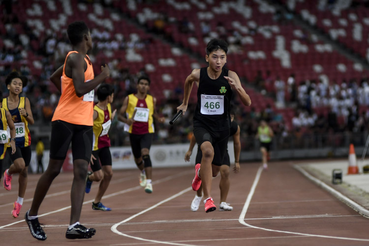 St. Patrick’s Lai Hikaru Jo Yip (#466) on the third leg of the C Div boys' 4x400m relay final. (Photo 1 © Iman Hashim/Red Sports)