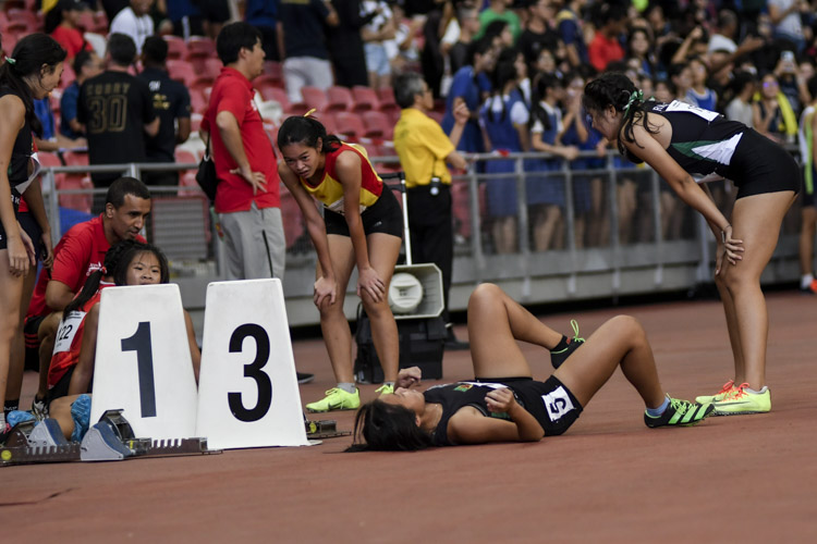 The aftermath of the A Div girls' 4x400m relay final. (Photo 1 © Iman Hashim/Red Sports)